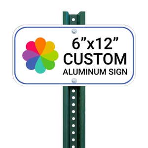 Custom 6”x12” aluminum sign with rounded corners mounted on a green metal post