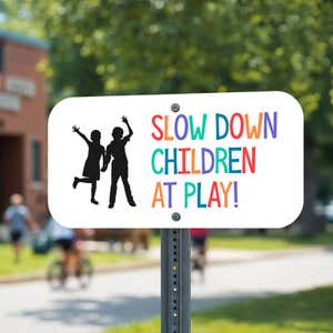 Custom traffic safety sign with a child icon that reads in colorful text: Slow Down Children At Play!