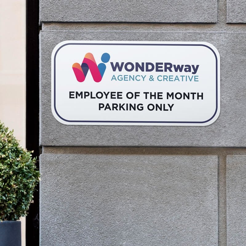 Custom 6”x12” Wonderway Agency & Creative sign that reads Employee of The Month Parking Only