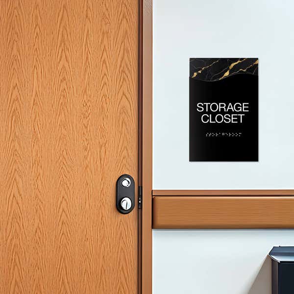 A 2-layer modern flow ADA sign for a storage closet with a black foreground and a black marble background