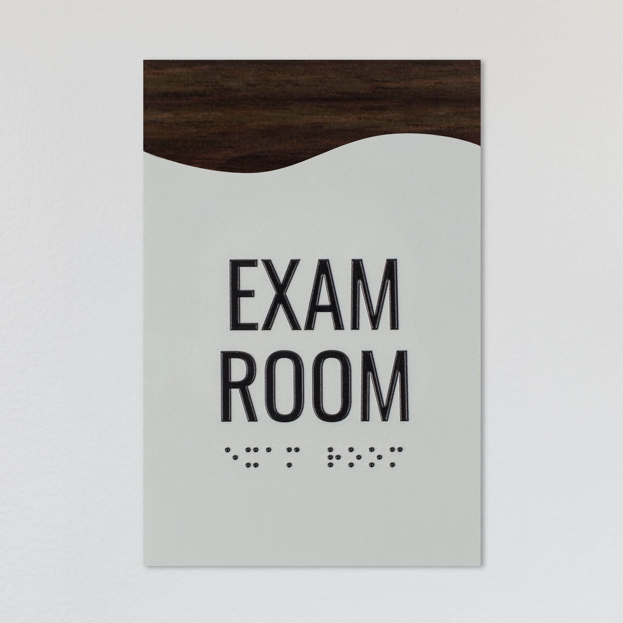 A design example for the modern flow 2-layer ADa sign with a gray foreground and brown wood background A design example for the modern flow 2-layer ADa sign with a gray foreground and brown wood background