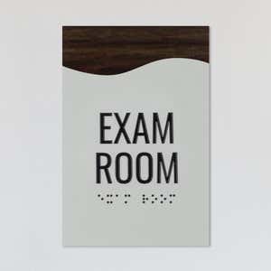 A design example for the modern flow 2-layer ADa sign with a gray foreground and brown wood background