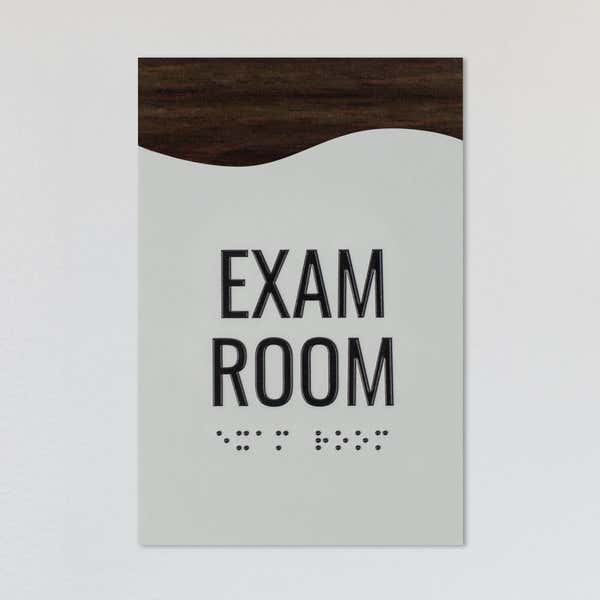 A design example for the modern flow 2-layer ADa sign with a gray foreground and brown wood background
