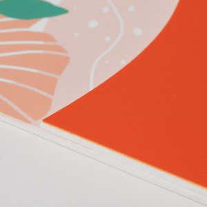 A close-up on the 2-layer modern flow ADA sign layers