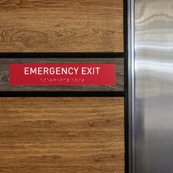 Custom ADA sign for an emergency exit