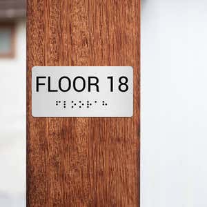 Custom ADA sign for an 18th floor