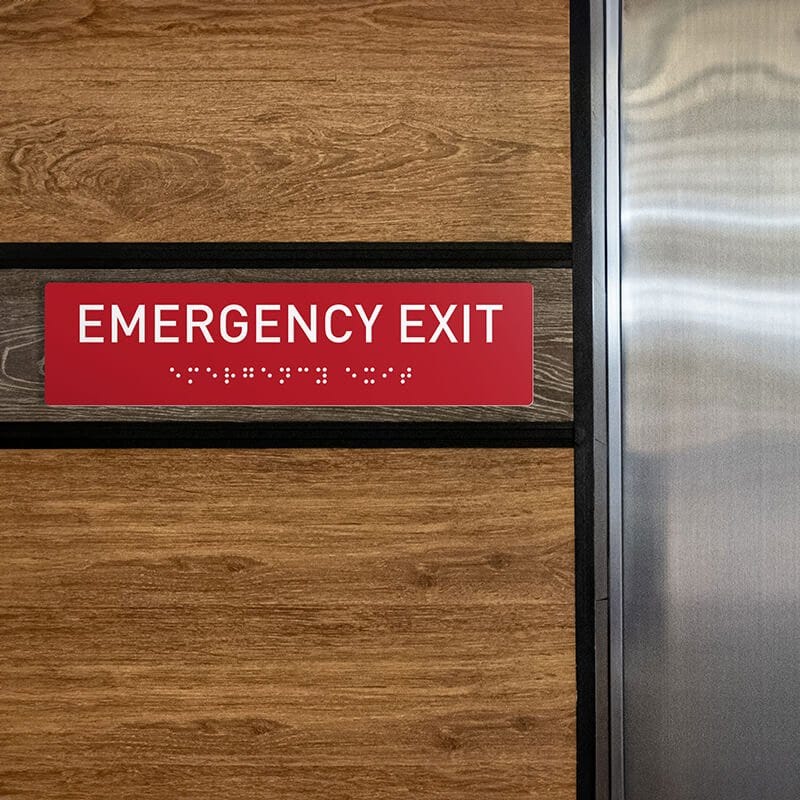 Custom ADA sign for an emergency exit