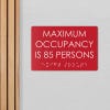 Custom ADA sign for a maximum occupancy warning