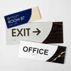 Three different sizes of the modern sleek 2-layer ADA sign next to each other