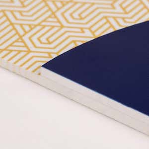 A close-up on the two layers of the modern sleek design ADA sign