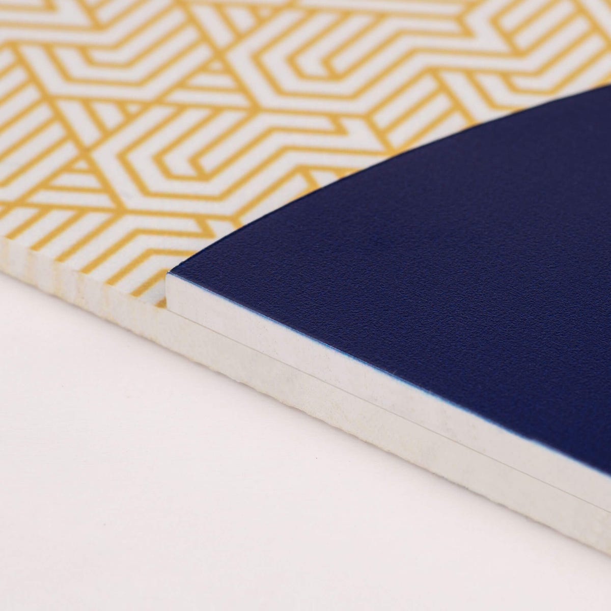 A close-up on the two layers of the modern sleek design ADA sign