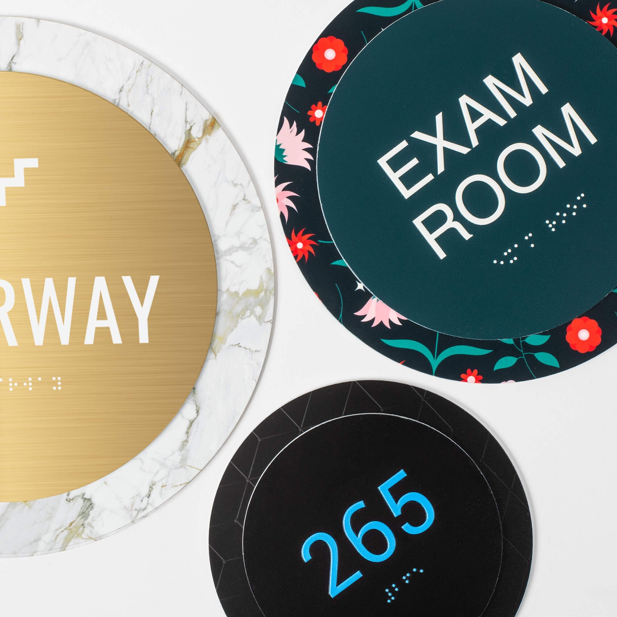 Various round 2-layer ADA signs displayed next to each other Various round 2-layer ADA signs displayed next to each other