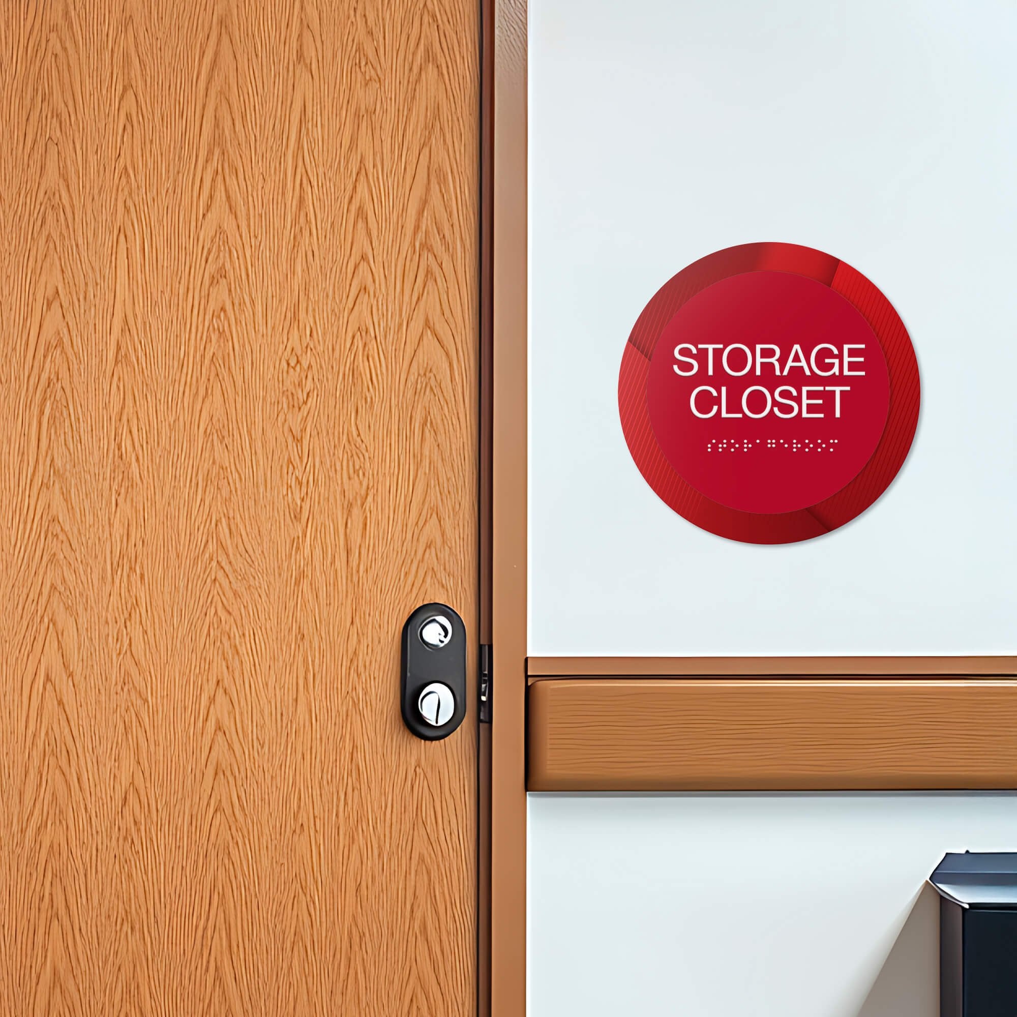 A 2-layer round ADA sign for a storage closet next to a doorway A 2-layer round ADA sign for a storage closet next to a doorway