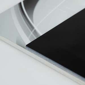 A close-up on the two layers of the ADA sign