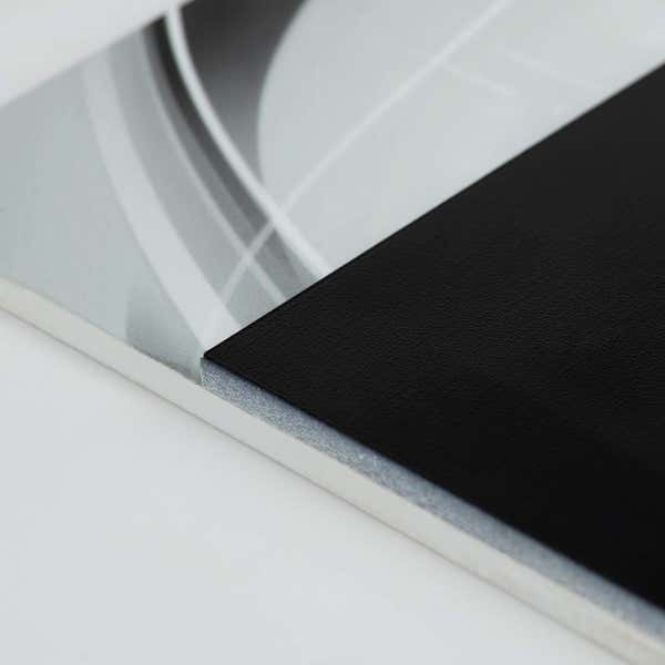A close-up on the two layers of the ADA sign