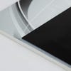 A close-up on the two layers of the ADA sign