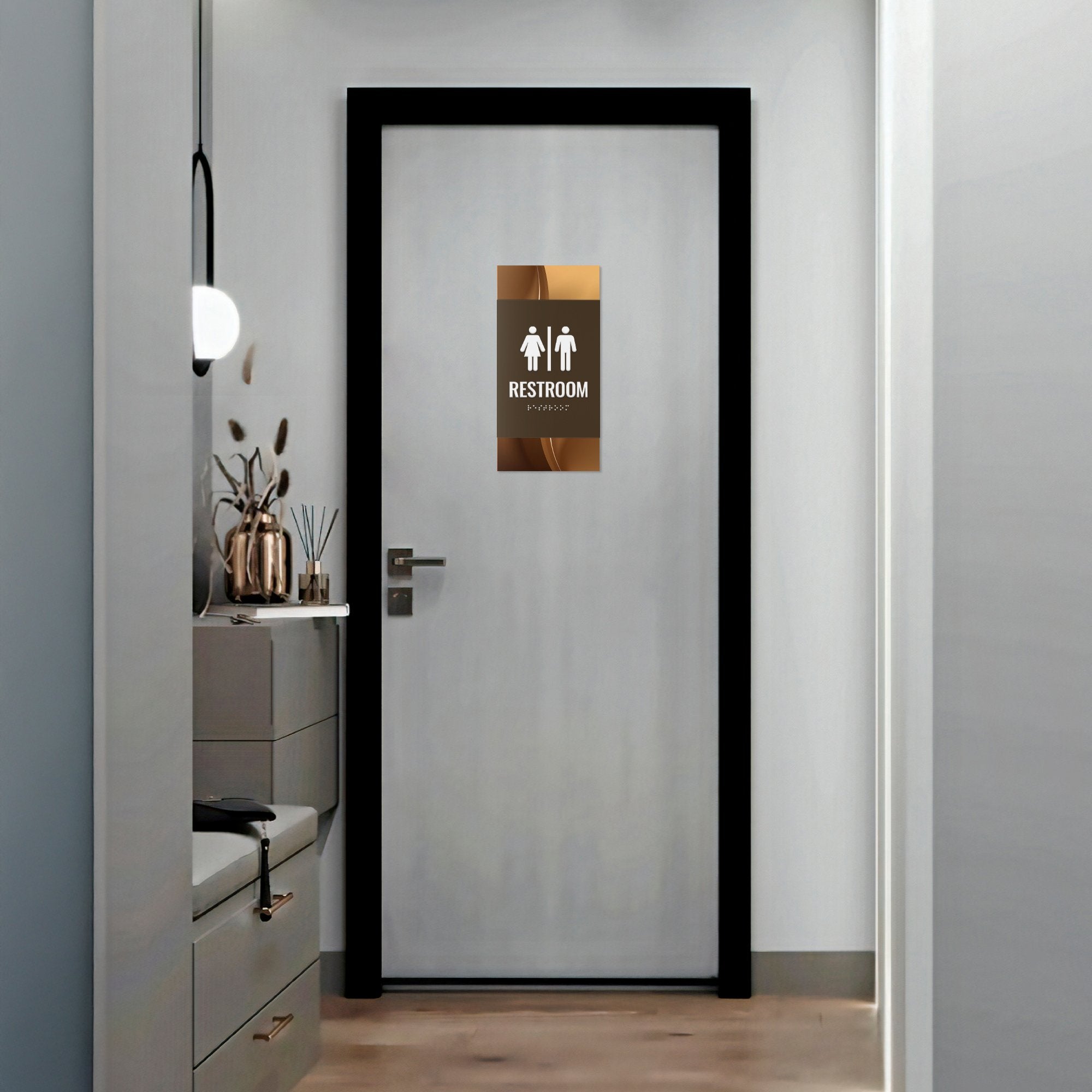 A vertical 2-layer ADA sign for a restroom with the brown foreground and caramel swoop background