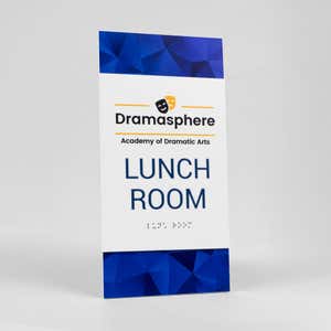 A design example of the 2-layer ADA sign for a lunchroom with the school name and logo above the text