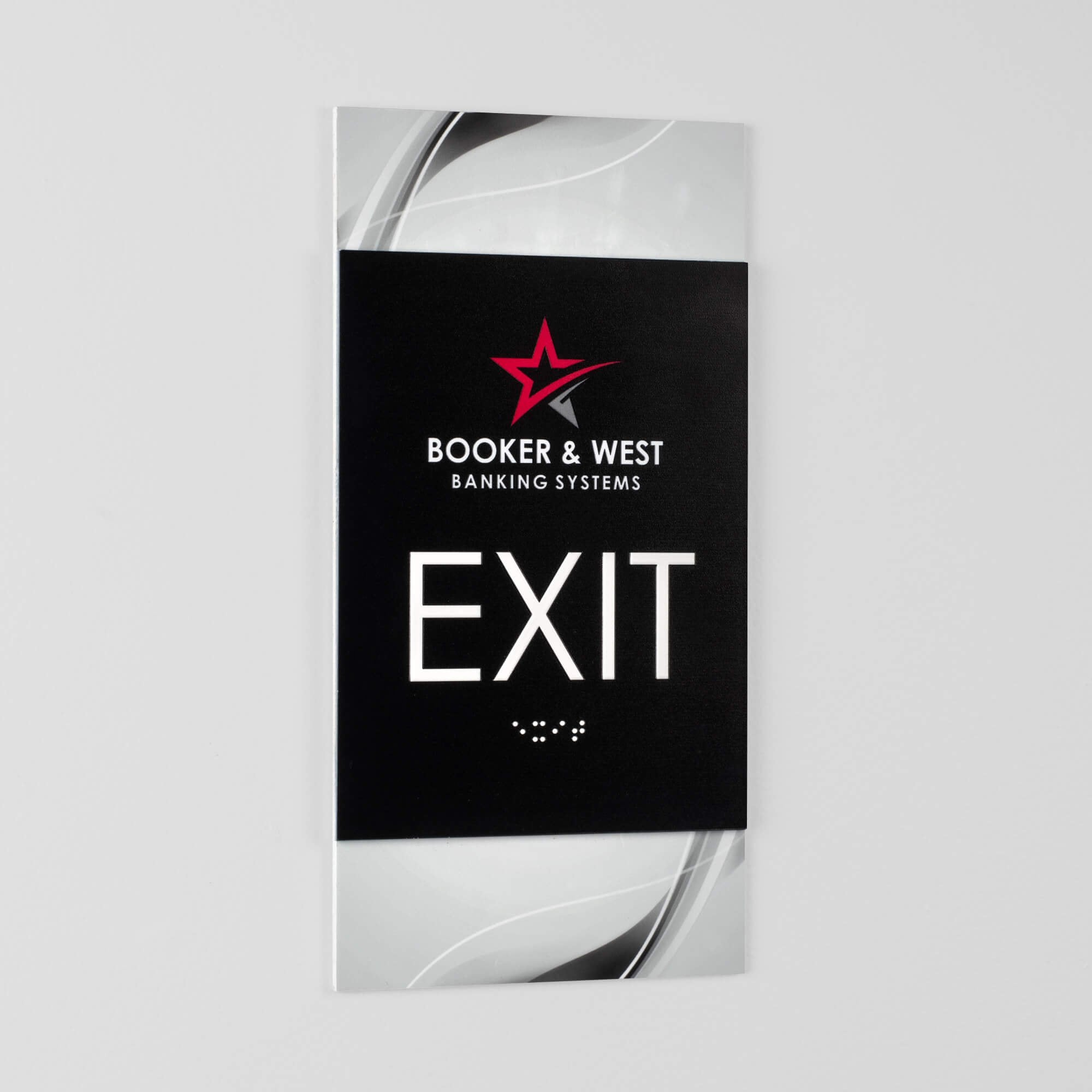 A sideways angle of the vertical 2-layer ADA sign to show the layers