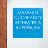 Custom ADA sign for a maximum occupancy warning