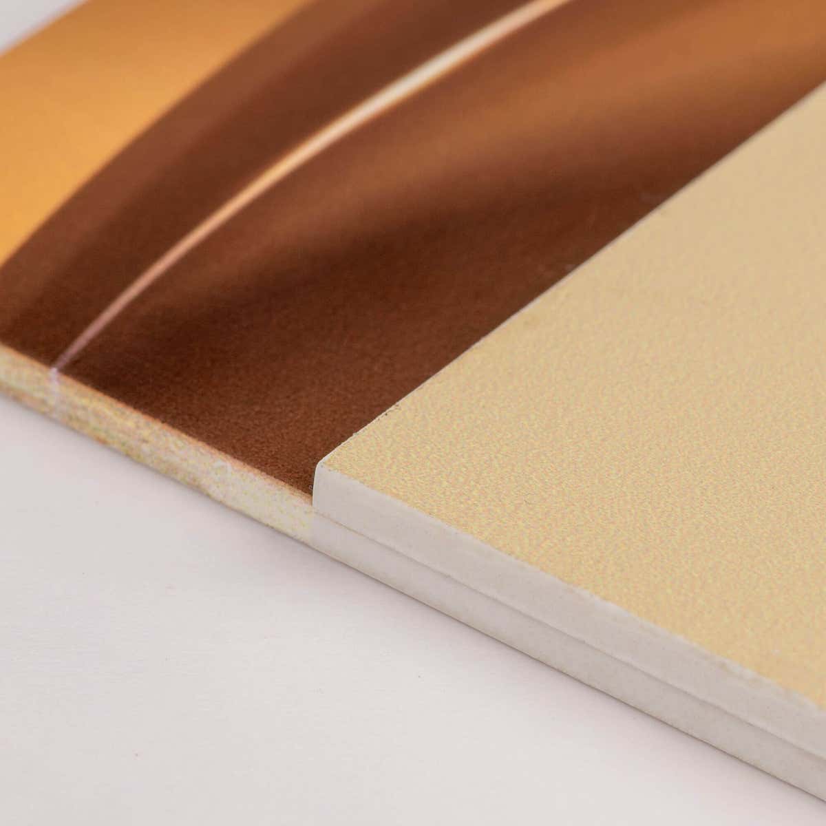 A close-up of the layers on the custom two-tone layered ADA sign