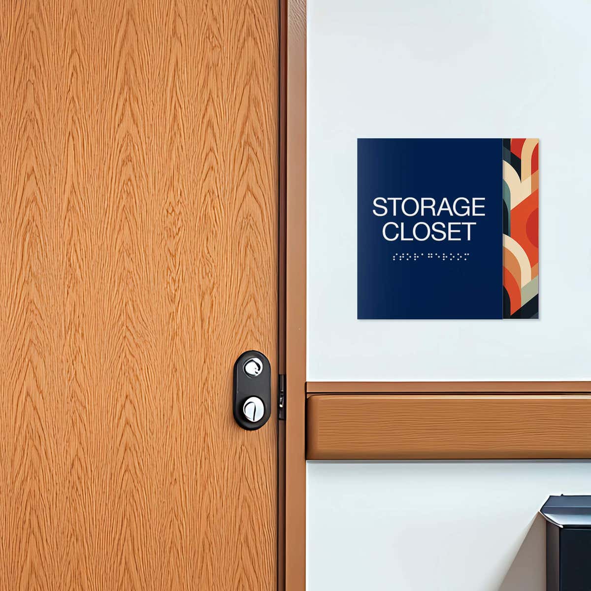 A layered ADA sign for a storage closet with a blue foreground and multi geometric background