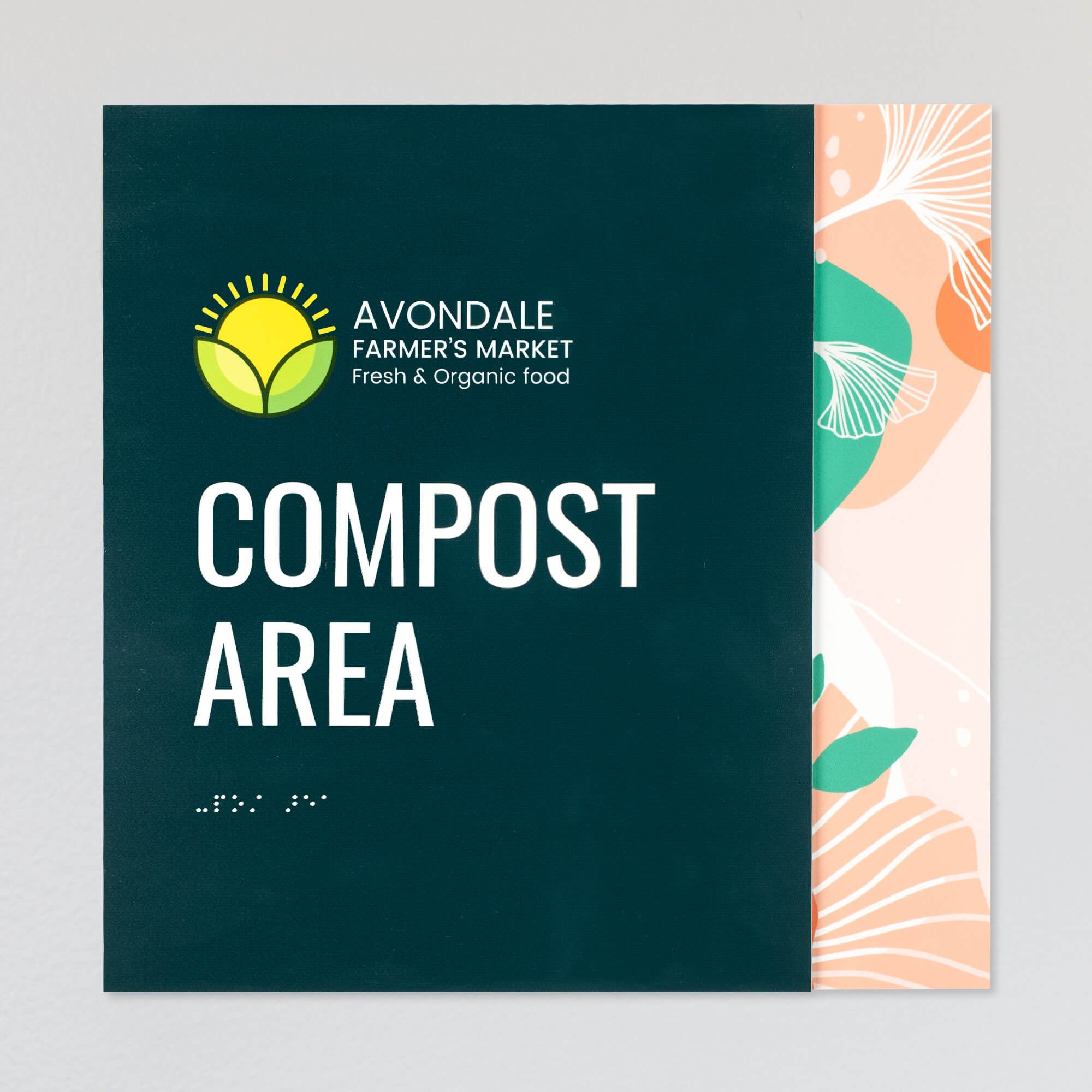 An example of a layered ADA sign design for a compost area with a green foreground and an orange floral background An example of a layered ADA sign design for a compost area with a green foreground and an orange floral background