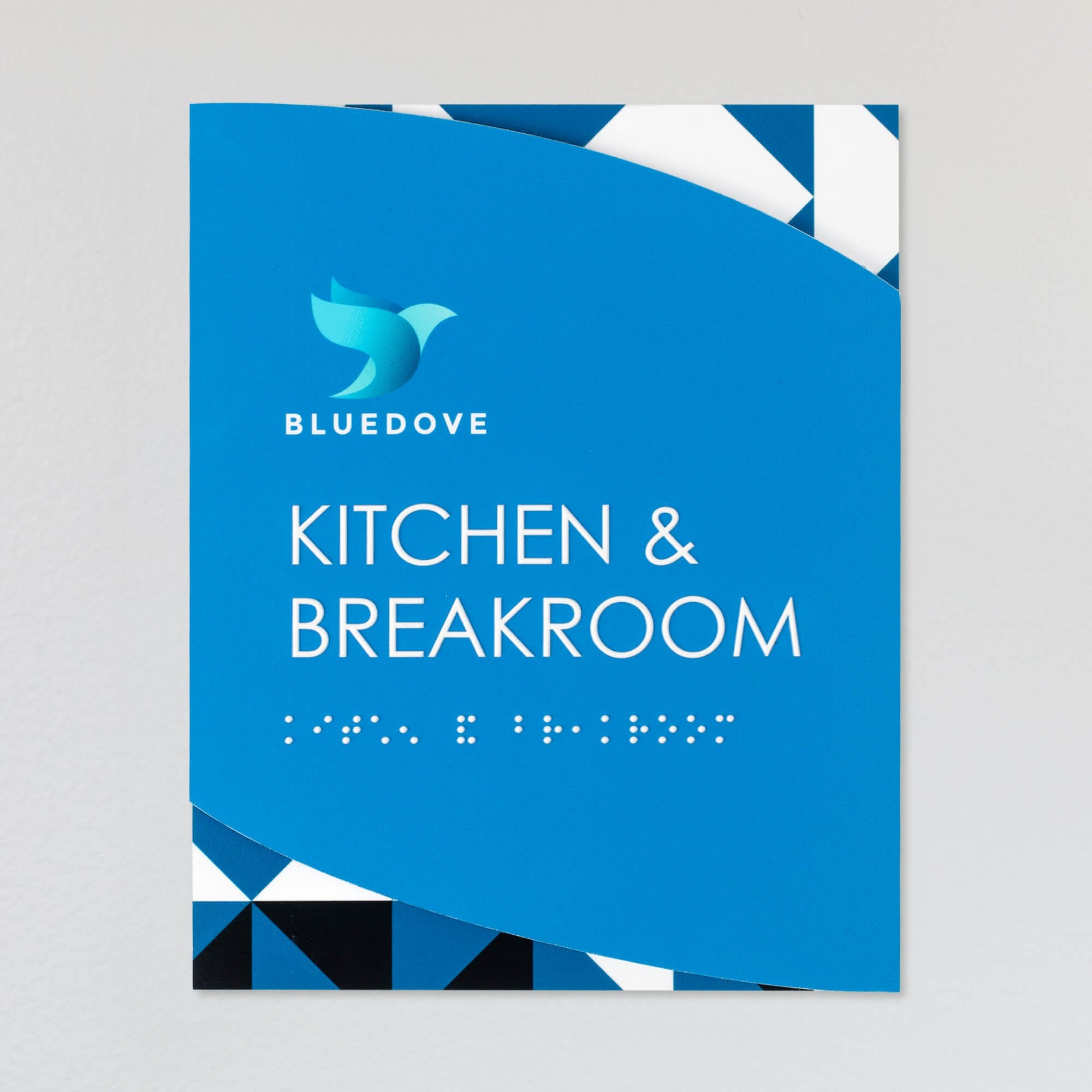A design example of the modern twist ada sign with a blue geometric background and baby blue foreground for a kitchen and breakroom