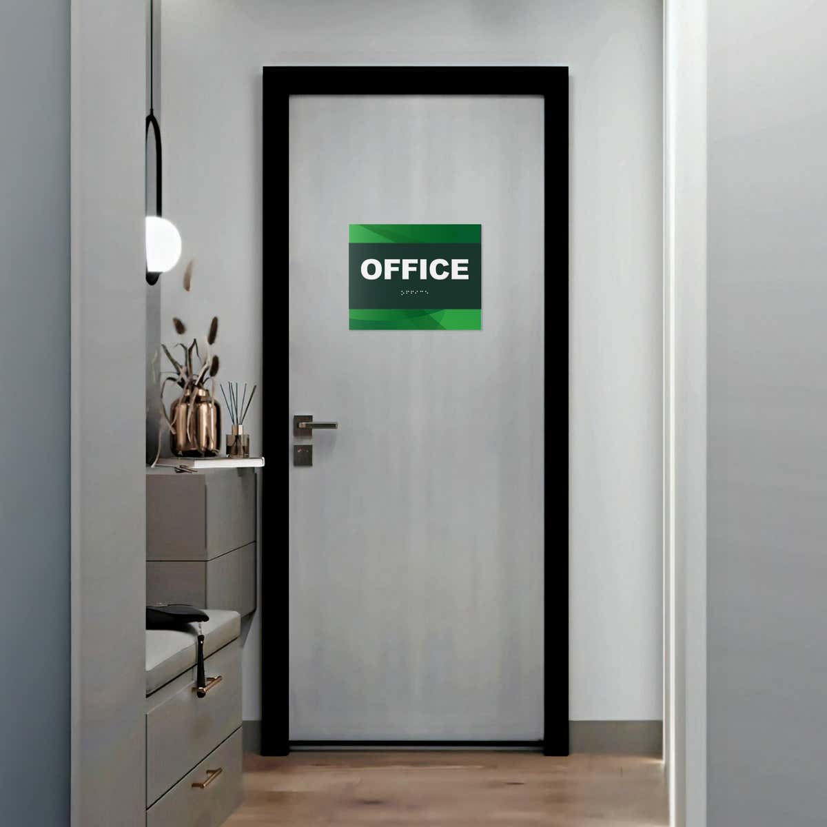 A 2-layered ADA sign for an office with a green foreground and green gradient background