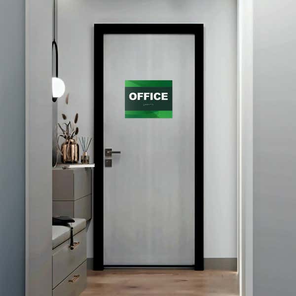 A 2-layered ADA sign for an office with a green foreground and green gradient background