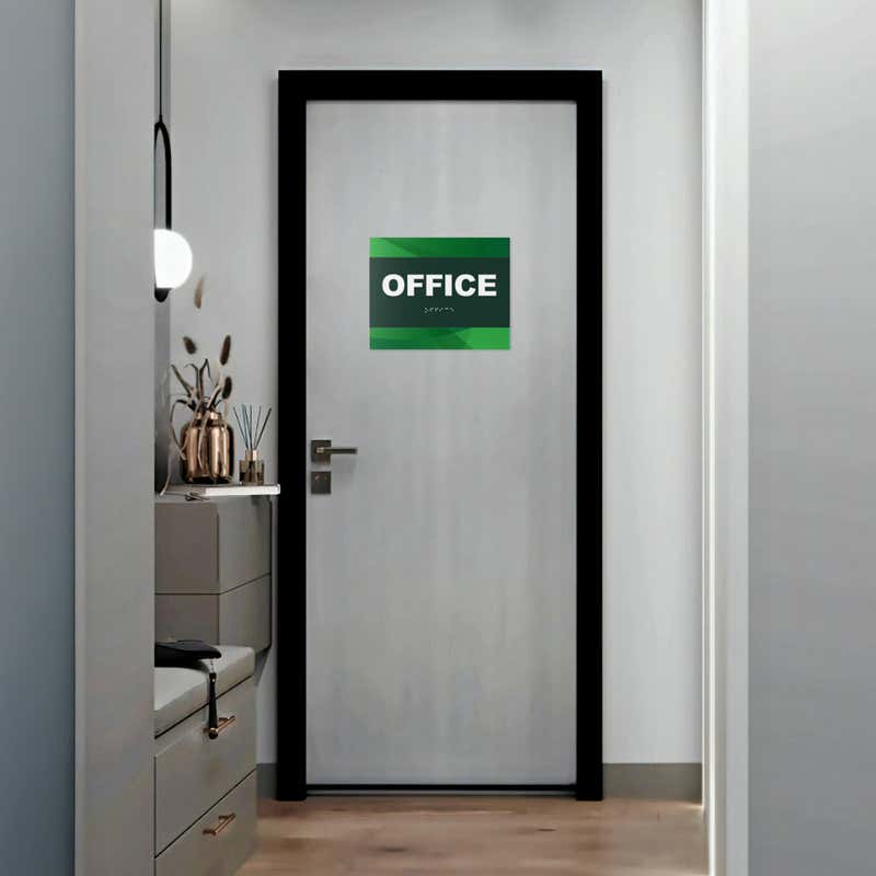 A 2-layered ADA sign for an office with a green foreground and green gradient background