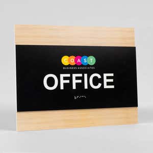A design example of the horizontal 2-layer ADA sign for an office with a colorful logo 