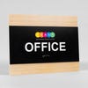 A design example of the horizontal 2-layer ADA sign for an office with a colorful logo 
