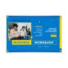 Blue and yellow vinyl banner with bold business event design and photo print, shown flat on white background with visible corner grommets