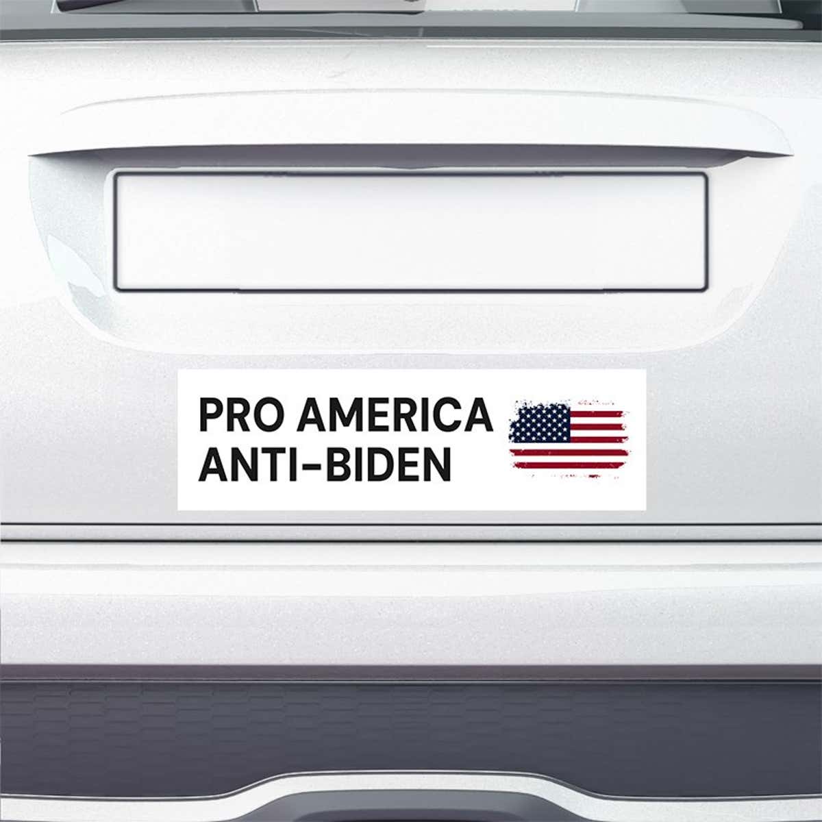 Pro America Anti-Biden bumper sticker on the bumper of a white car