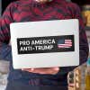 Pro America Anti Trump bumper sticker on a laptop