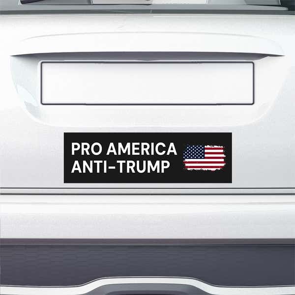 Pro America Anti Trump bumper sticker on the bumper of a white car