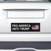 Pro America Anti Trump bumper sticker on the bumper of a white car