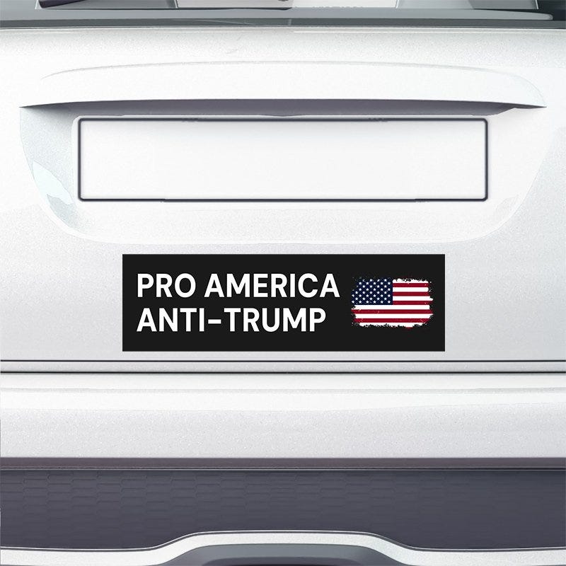 Pro America Anti Trump bumper sticker on the bumper of a white car