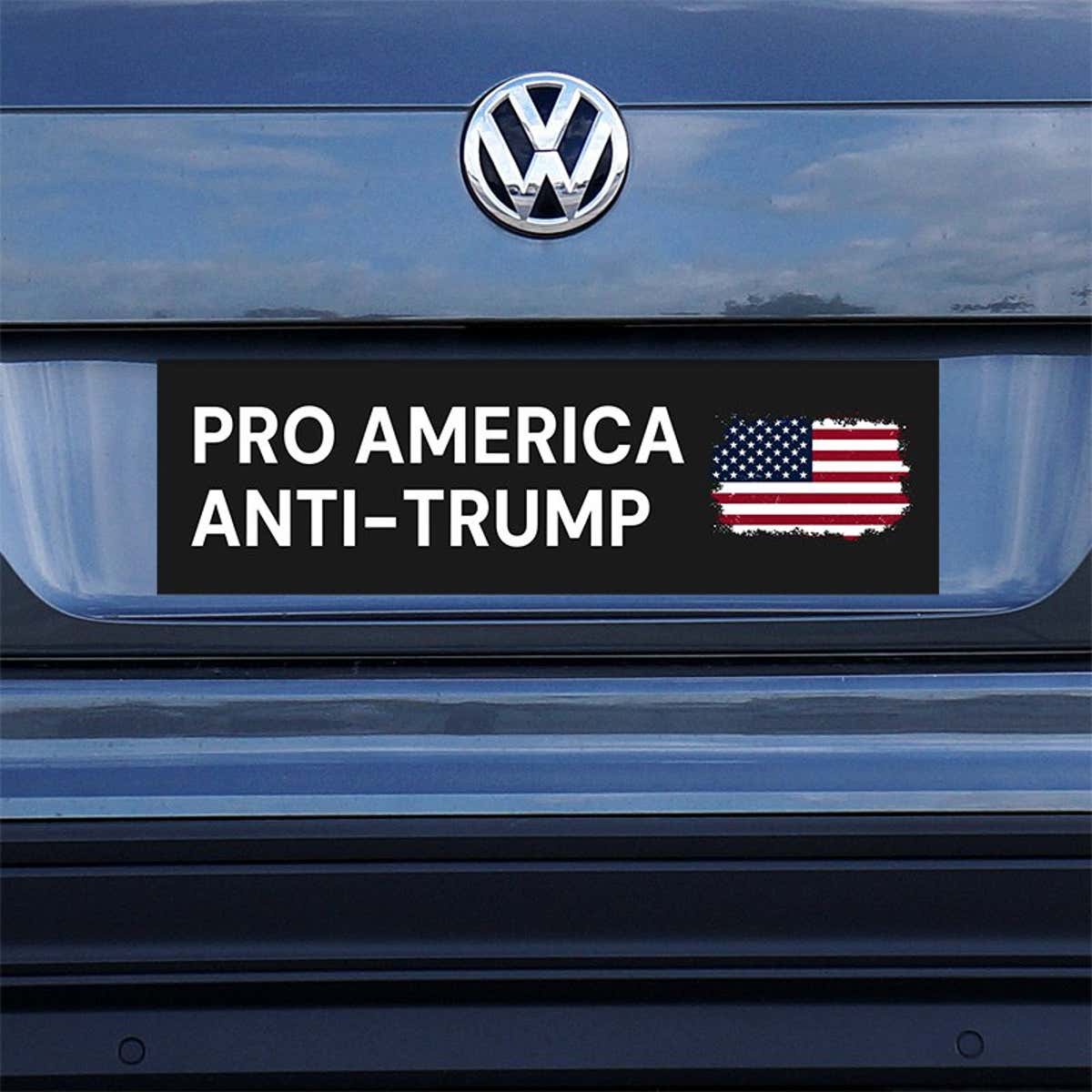 Pro America Anti Trump bumper sticker on a gray car