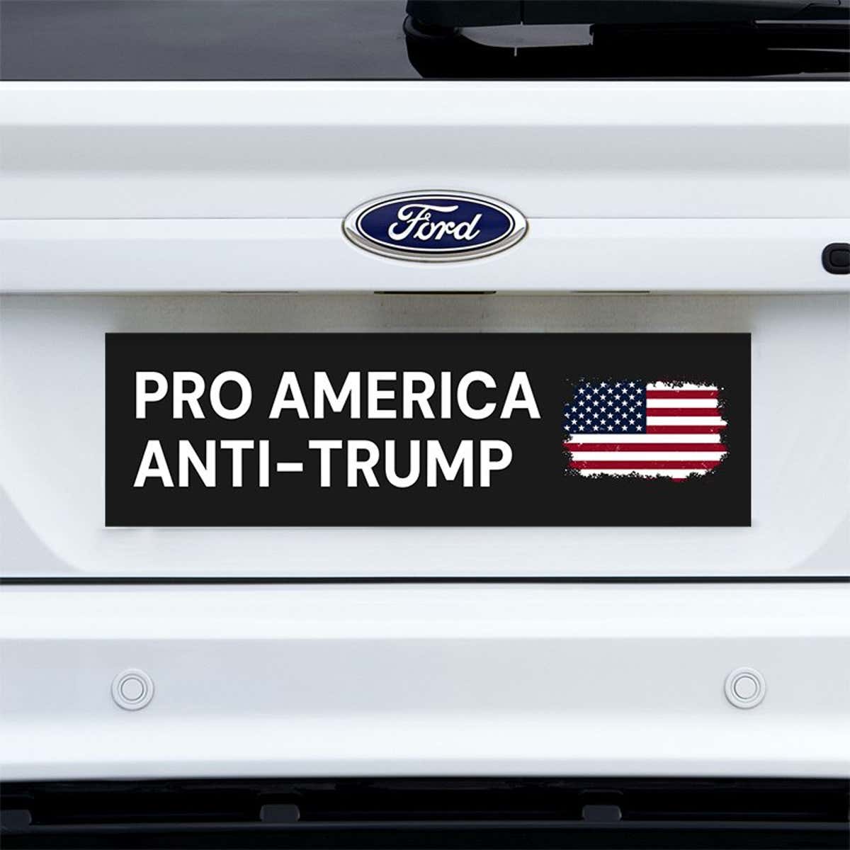 Pro America Anti Trump bumper sticker on a white truck