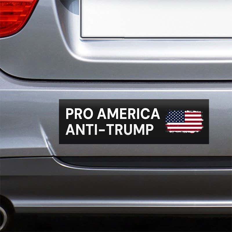 Pro America Anti Trump bumper sticker on the bumper of a gray car