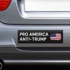 Pro America Anti Trump bumper sticker on the bumper of a gray car