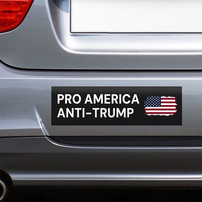 Pro America Anti Trump bumper sticker on the bumper of a gray car