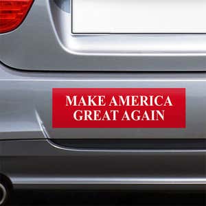 Make American Great Again Bumper Sticker on the bumper of a gray car
