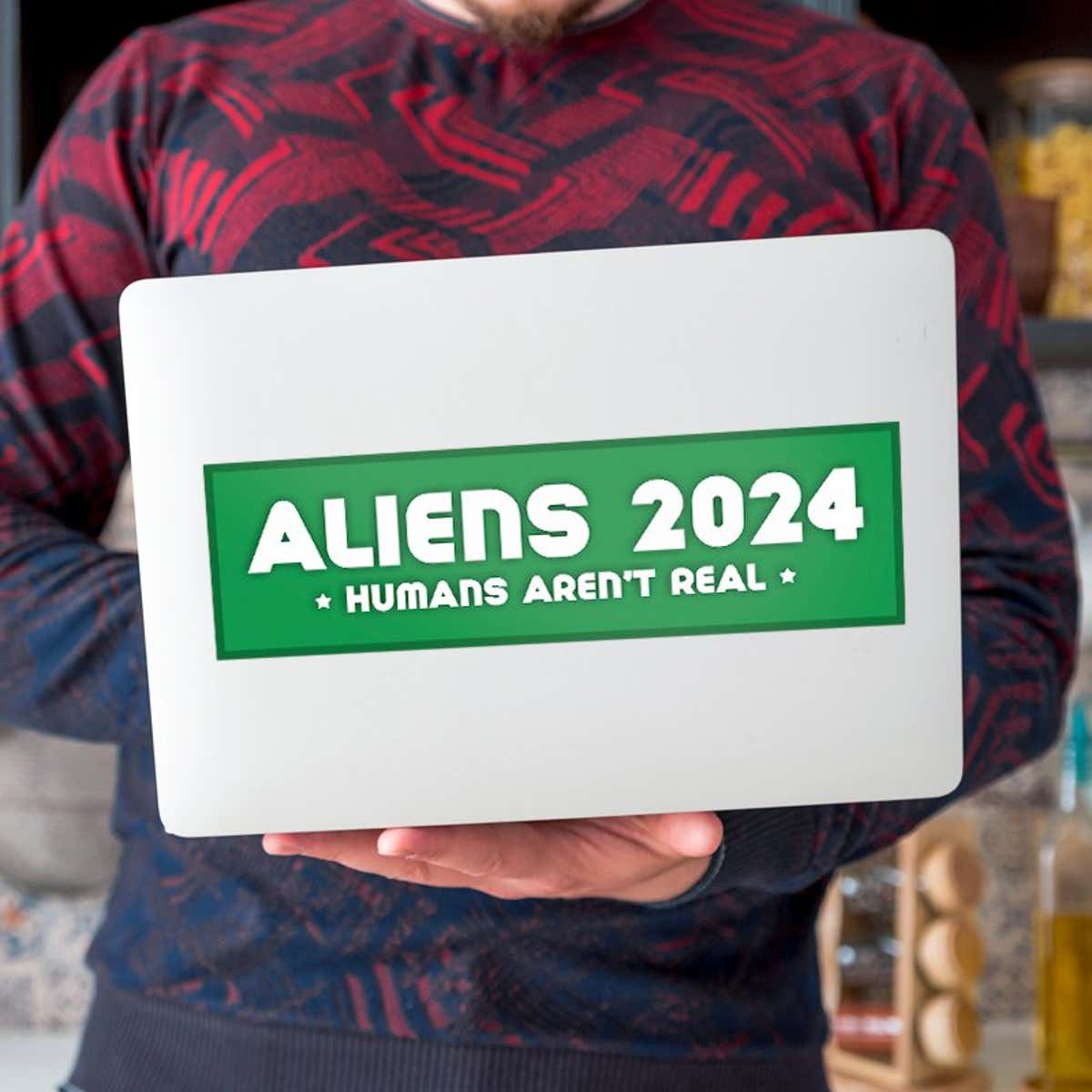 Aliens - Humans Aren't Real Bumper Sticker on a laptop