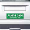 Aliens - Humans Aren't Real Bumper Sticker on the bumper of a white car