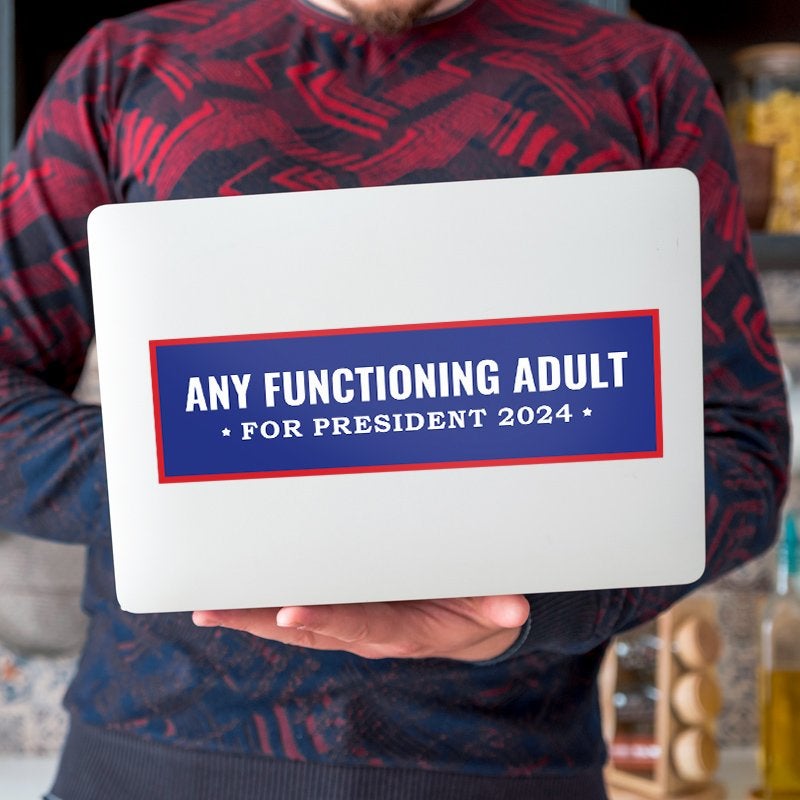 Any Functioning Adult Bumper Sticker on a laptop
