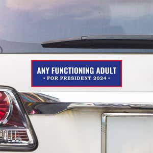 Any Functioning Adult Bumper Sticker above a white car's tail light