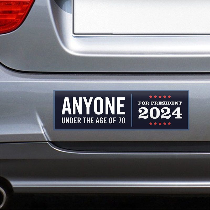 Anyone Under 70 bumper sticker on the bumper of a gray car